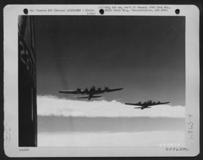 Thumbnail for Consolidated > Two Boeing B-17 "Flying Fortress" Part Of The 381St Bomb Group Formation, Roar Toward Their Objective - An Enemy Installation Somewhere In Europe.