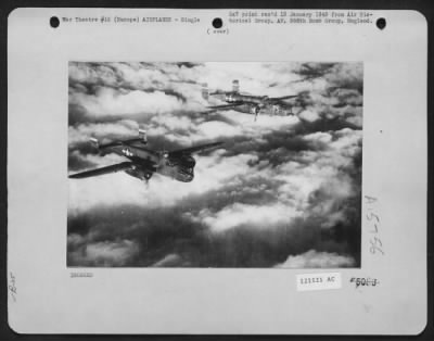 Thumbnail for Consolidated > Two North American B-25 'Mitchells' Wing Their Way Above A Carpet Of Clouds Enroute To Bomb Enemy Installatioin Sonewhere In Europe.