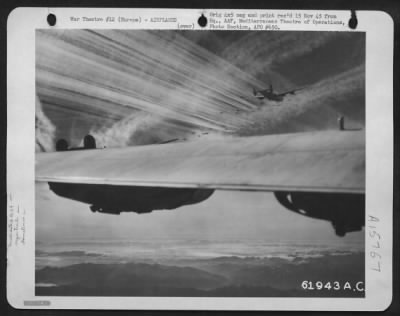 Thumbnail for Consolidated > As They Gained Altitude On Their Way To Plaster An Enemy Installation, These Consolidated B-24 Liberator Bombers Left A Pattern Of Vapor Trails In Their Wake.  15Th Air Force.