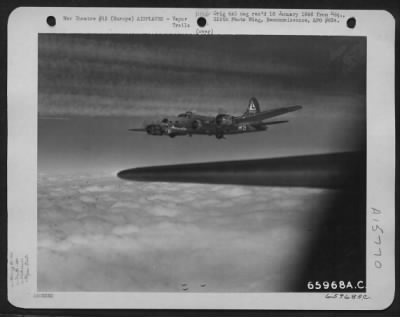 Thumbnail for Consolidated > Against A Background Of Vapor Trails Etched By Proceding Heavy Bombers, The Boeing B-17 "Flying Fortress" 'Bacta Th' Sac' Of The 381St Bomb Group Heads Toward Its Objective, Somewhere In Europe.