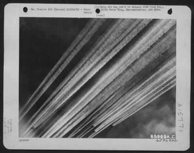 Thumbnail for Consolidated > Boeing B-17 Flying Fortresses Of The 381St Bomb Group Leave Bright Streamers Of Condensing Vapor To Form A Pattern Of Doom For The Nazis To Gaze Upon As 8Th Air Force Bombers Continue Their Attacks Against Enemy Targets In Europe.