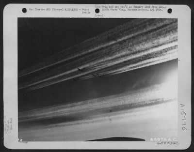 Thumbnail for Consolidated > Boeing B-17 Flying Fortresses Of The 381St Bomb Group, En Route To Bomb Enemy Installations Somewhere In Europe, Lay A Carpet Of Vapor Trails As They Speed Toward The Target.