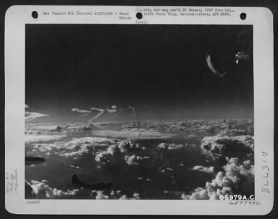 Thumbnail for Consolidated > Vapor Trails Left By Boeing B-17 Flying Fortresses Of The 381St Bomb Group Mingle With Clouds As The Planes Fly Toward Their Objective Somewhere In Europe.