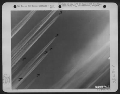 Thumbnail for Consolidated > Boeing B-17 Flying Fortresses Of The 381St Bomb Group, En Route To Bomb Enemy Installations Somewhere In Europe, Leave Streams Of Condensing Vapor Trails.