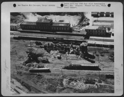 Thumbnail for Consolidated > Through The Main Railroad Yards At Bologna Funnelled Traffic From France, Germanym The Balkans, As Well As From The Great Northern Industrial Areas Of Italy. Thus Bologna Was Always A Choice Target For Heavies Of The 15Th A.F. This Photo Shows How The Bol