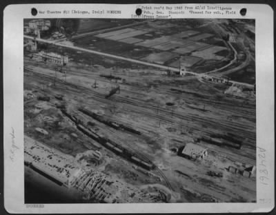 Thumbnail for Consolidated > Through Bologna'S Rail Yards Funnelled Traffic From France, Germany, The Balkans, And The Great Northern Industrial Areas Of Italy.  Thus Bologna'S Rail Center Was Always A Favorite 15Th Af Target.  This Is How The Yards Fared Under Air Attack.  The Photo