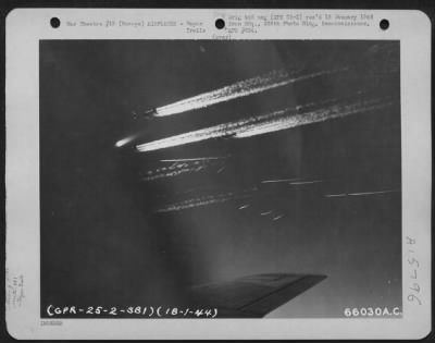 Thumbnail for Consolidated > Boeing B-17 Flying Fortresses Of The 381St Bomb Group En Route To Bomb Enemy Installations In Europe Leave Vapor Trails In The Sky.  18 January 1944.