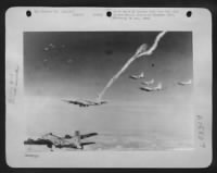 A Formation Of Boeing B-17S Drop Their Explosive Loads On The White Plume Of A Smoke Marker Dropped By A Mickey Lead Plane To Indicate The Location Of A Target Totally Obscured From Sight By Heavy Leayers Of Clouds. - Page 11