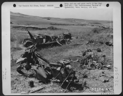 Thumbnail for Consolidated > Bomb Damage To Nazi Vehicles South Of Rome, Italy.  [Vehicles In Foreground Are Medium Motorcycles.]