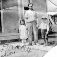 Vic Sr., Joe & Adeline in front of house