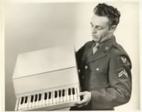 Thumbnail for My Father in WWII with a Combat Piano used to rehab the wounded.