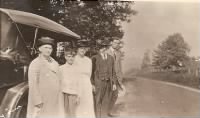 Thumbnail for L to R - Emily & Carlton Perry-Cornelia Pierce-C Emerson & Cyrus Pierce standing in front of Ruberta Pierces first car 1920.JPG