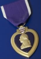 Purple Heart for Injuries sustained in an armed comflict battle.