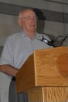 Col Bill Bower, about 90 years old, giving a presentation.