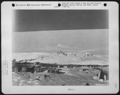 Thumbnail for General > Beachhead Station With Part Of Trail Leading To Commanche Bay Weather Station.  In The Foreground Can Be Seen Some Of The Fuel Supply In Drums.  10 Oct 1944.