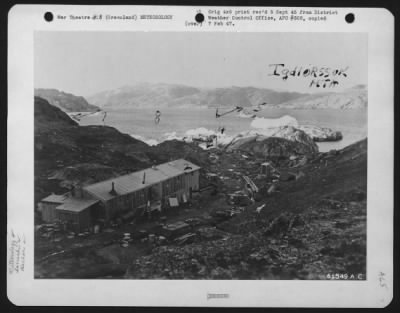 Thumbnail for General > Prince Christian'S Sound, Greenland.  Photo Shows Barracks Area, Dock Area, And Harbor Area At The Station.  Picture Taken From Hill Leading To Weather-Radio Operations Building.  (1) Barracks And Present Recreation Room On Left Side, Outside The Kitchen