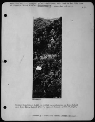 Thumbnail for General > Wrecked Consolidated B-24D is spotted on mountainside on Cocos Island near Costa Rica, Central America, where it burned a patch of jungle.