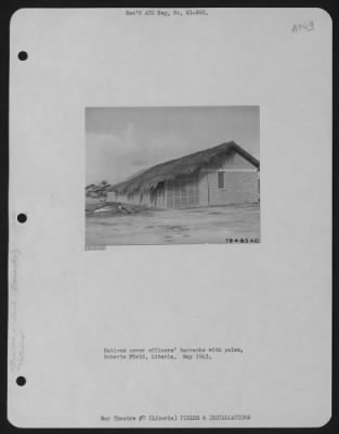 Thumbnail for General > Natives Cover Officers' Barracks With Palms, Roberts Field, Liberia.  May 1943.