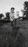 Thumbnail for Pvt. Ralph Hickmon in a pre-service photograph with one of his sons.