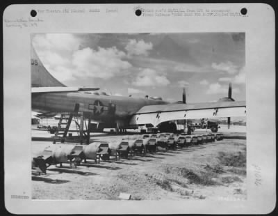 Thumbnail for General > 500-lb demolition bombs are lined up to be loaded into a B-29 which will take them to an advanced China base. There the bombs are to be used for a raid on the Jap-held island of formosa.