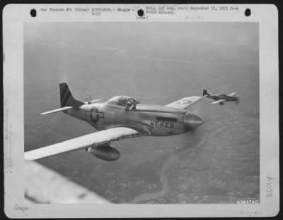 North American > Close-Up Of P-51 Mustang Fighter Escorts For 14Th Af C-47 Over China.  24 August 1945.