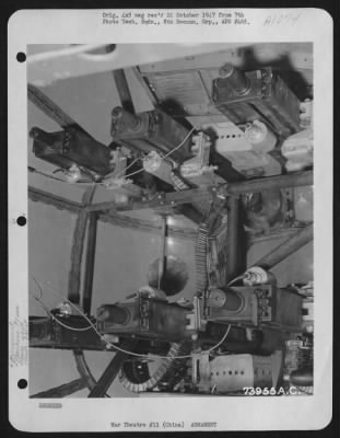 General > Installation Of Six 50 Cal. Machine Guns In The Nose Of A North American B-25 Of The 490Th Bomb Group, 341St Bomb Group, China.