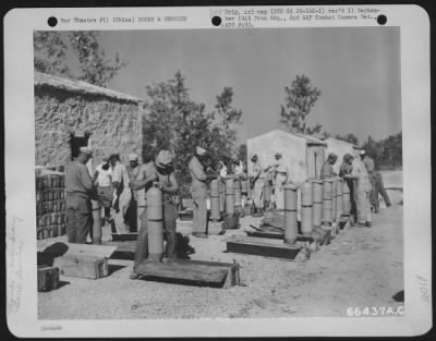 Thumbnail for General > M47 A2 Chemical Incendiary Bombs Being Unpacked From Their Crates And Being Prepared For Use On A Xx Bomber Command Boeing B-29 Raid.  China.