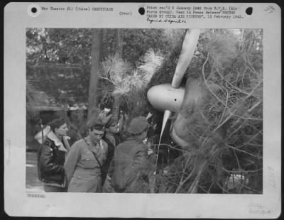 Thumbnail for General > A Camouflaged Jap Zero Plane Is Being Inspected Here By Colonel Merian C. Cooper, Left, Brig. Gen. Claire L. Chennault, Right, Commanding General Of The China Air Task Force Of The United States Army Air Force, And Two Other Officers.