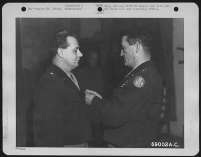 Thumbnail for Awards > Brig. General Albert F. Hegenberger Receives The Air Medal From Major General Claire L. Chennault, Commanding General Of The 14Th Air Force, Somewhere In China.  25 March 1945.