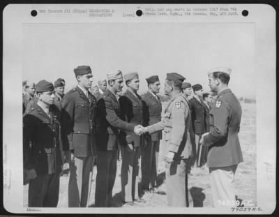 Thumbnail for Awards > Capt. John C. Ruse Is Congratulated By Brig. General Claire L. Chennault After Receiving An Award During A Ceremony At Kumming, China On 16 February 1943.