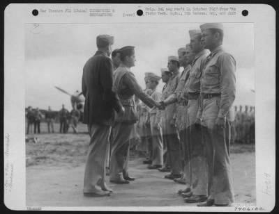 Thumbnail for Awards > 1St. Lt. Elmer Tarbox Of Higgins, Texas Is Congratulated By Brig. General Claire L. Chennault After A Receiving The Silver Star During A Ceremony At An Air Base Somewhere In China On 20 December 1942.