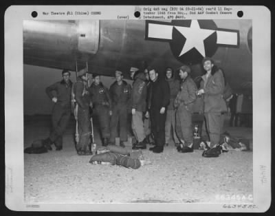 Thumbnail for General > Back On The Ground, This Crew Of A Boeing B-29 "Superfortress", Headed By Capt. Linebaugh, Pilot, Finds It Difficult To Settle Down For A Group Picture.  China.