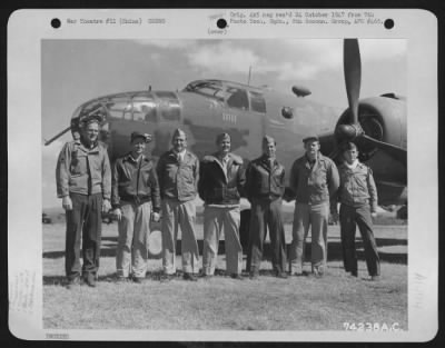 General > A Crew Of The 11Th Bomb Squadron, 341St Bomb Group, Poses Beside Their North American B-25 Plane "Ripper Ii" At An Airfield Somewhere In China, 2 February 1943.  They Are: Capt. R.V. Ford, Winston-Salem, North Carolina, Pilot Lt. F.F. Young, Ponca City, O