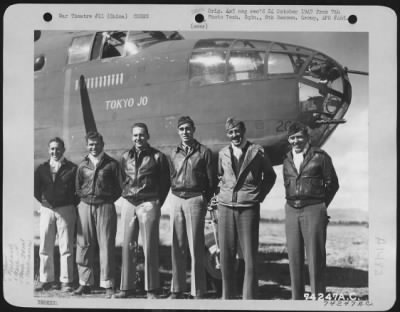 General > Crew Of The 11Th Bomb Squadron, 341St Bomb Group, Poses Beside Their North American B-25 "Tokyo Jo" At An Airfield Somewhere In China, 2 February 1943.  They Are: Capt. E.W. Holstrom, Tacoma, Washington, Pilot And Squadron Commander Lt. L.J. Murphy, Silve