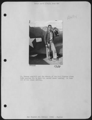 Fighter > Lt. Duncan Couldn'T Get The Wheels Of His P-40 Fighter Plane Down, Causing Him To Make His Second Crash Landing.  He Came Out Of His Plane Smiling.