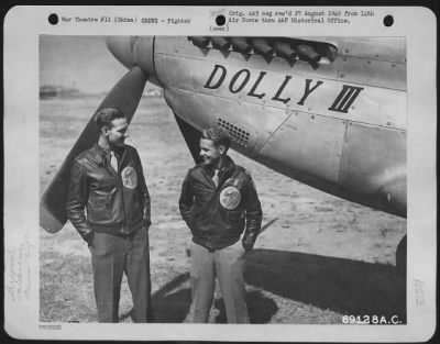Fighter > Captain Pierce And Captain Hasse Chat Together By The Curtiss P-40 [P-51 Hand Written Above It] "Dolly Iii" Of The 14Th Air Force At A Base In China.  26 October 1945.