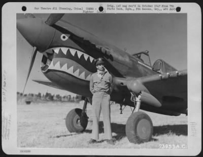 Fighter > Colonel Robert L. Scott, Jr. (Macon, Georgia) Commanding Officer Of The 23Rd Fighter Group, Stands Beside His Curtiss P-40 At Kunming, China Before His Departure To The United States. 4 January 1943.