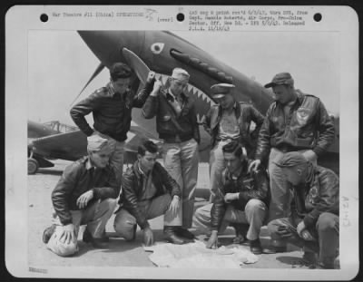 Thumbnail for General > Walker's Club. Members have been forced down back of Jap lines and have spent 1 to 7 weeks in returning to their bases. All had narrow escapes from Jap patrols, and one man led 31 Indian prisoners in a daring escape. Left to right standing: