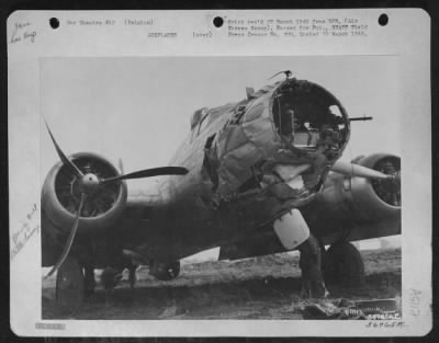 Thumbnail for Battle Damage > Victim of one of the war's most freakish accidents, this Boeing B-17 rests with a smashed nose and a twisted propeller after an emergency landing at a 9th Air force Republic P-47 Fighter Base in Belgium. Starting from its English Base with ten crew