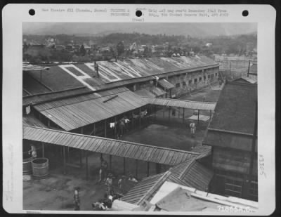 Thumbnail for General > General View Of The Hanowa Prisoner Of War Camp #6 In Honshu, Japan.  Note The 'Pow' Markings And The Parachutes, Which Were Of Various Colors, Placed On The Roof Of A Building To Signify Their Location To Boeing B-29 Crews Who Dropped Supplies To The Int