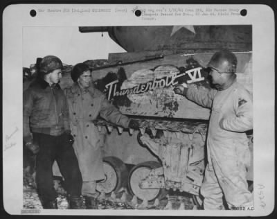 Thumbnail for General > To show his appreciation of tactical air power Lt. Col. Creighton Abranis, West Newton, Mass., right, commander of a 4th Armored Division Unit, named his tank, "Thunderbolt". Lt. Col. Abranis was at the head of the first unit to re-enter Bastogne