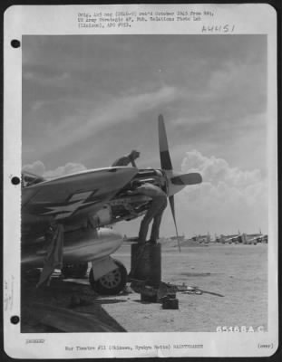 Thumbnail for Engines > Mechanics Of The 41St Fighter Group Checking North American P-51 "Mustang" For Mission Over Enemy Territory.  Yontan Airfield, Okinawa, Ryukyu Retto.  July 1945.