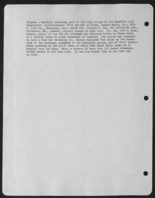 Thumbnail for General > Belgium-Ruefully examining part of the flak damage to the Republic P-47 Thunderbolt fighter-bomber "I'll Get By" is S/Sgt. Robert Rakow, Jr., 2116 S. 12th St., Sheboygan, Wis., while Pfc. Charles R. Eck, 511 Arlington Ave., Baltimore, Md., armorer