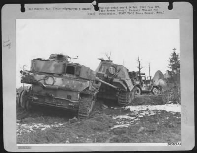 Thumbnail for General > Ninth Air force fighter-bomber pilots, spotting this German Tiger tank (background) towing the smaller Panther tank, disabled both vehicles on the Third Army front. Similar attacks by Republic P-47 Thunderbolts and Lockheed P-38 Lightnings