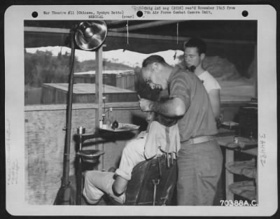 Thumbnail for Clinicaltreatment > A Patient Is Treated In The Dental Clinic Of The American Military Government Hosptial On Okinawa, Ryukyu Retto.  15 June 1945.