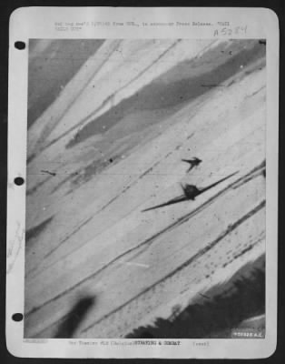 Thumbnail for General > This unusual photograph of a Luftwaffe pilot jumping from his damaged plane was made by Major James Dalglish, Rome, N.Y., a U.S. 9th Air force fighter-bomber pilot, during a recent air battle over the Belgian Bulge. The enemy pilot deserted his ship