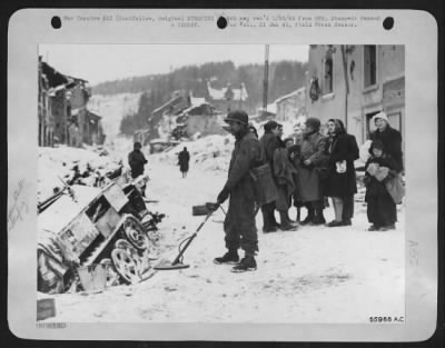 Thumbnail for General > First hand evidence concerning the effectiveness of Tactical Air Power in neutralizing a strong point is received by the Army from these residents of Houffalize, Belgium. In describing the bombardment of 9th Air force fighter-bombers preceding