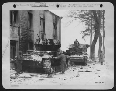 Thumbnail for General > These two German "flak wagons" shuttled through the Ardennes as part of the greatest concentration of mobile anti-aircraft weapons of the war until 9th AF fighter-bombers silenced them during recent fighting in the Belgian Bulge. Surmounting heavy