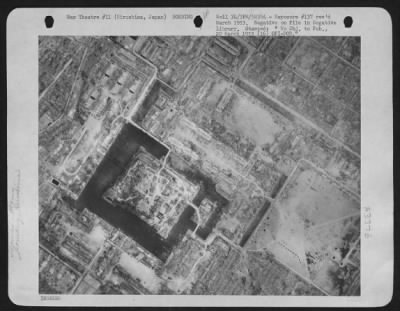 Thumbnail for Hiroshima > Exposure #137 - Destruction In Hiroshima, Japan After Dropping Of The First Atomic Bomb, Aug. 6 1945.  Note The Position Of Vehicle In Center Of Photo, In Comparison With Photos Exp. #136 & 138.  Taken 11 August 1945.