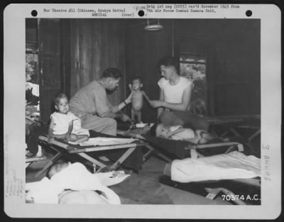 Thumbnail for Hospital Patients > Dr. Larnett And Another Member Of The American Military Government Hospital Staff Examine One Of The Okinawan Children Who Are Patients At The Hospital On Okinawa, Ryukyu Retto.  15 June 1945.